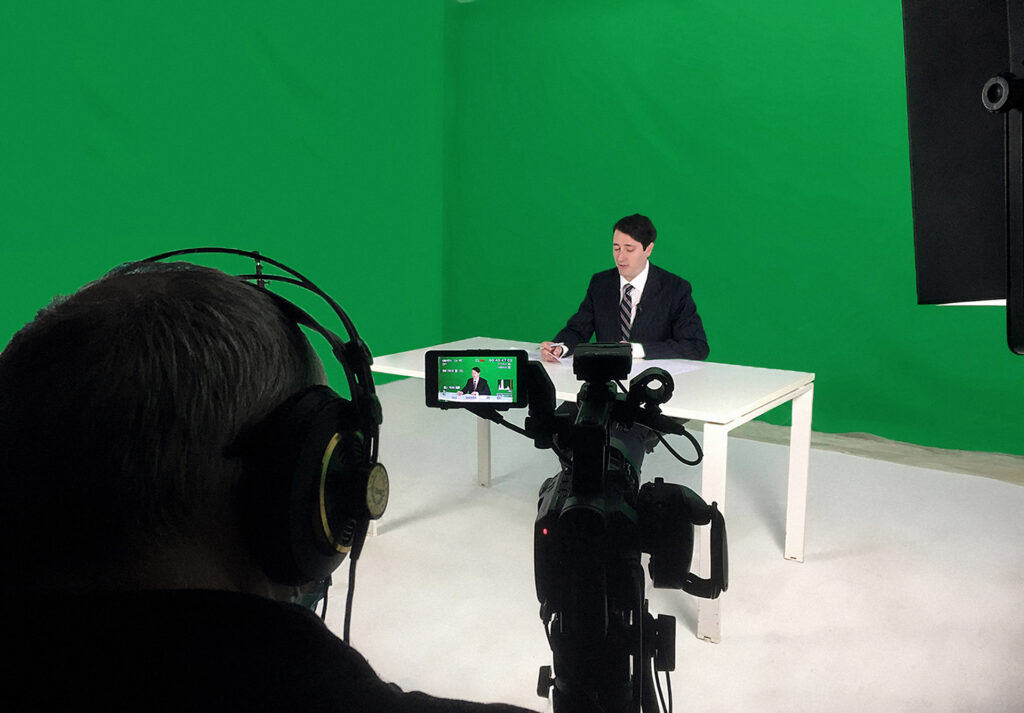 A behind-the-scenes look at the making of a news broadcast with green screen at Studio A, Instudio.org