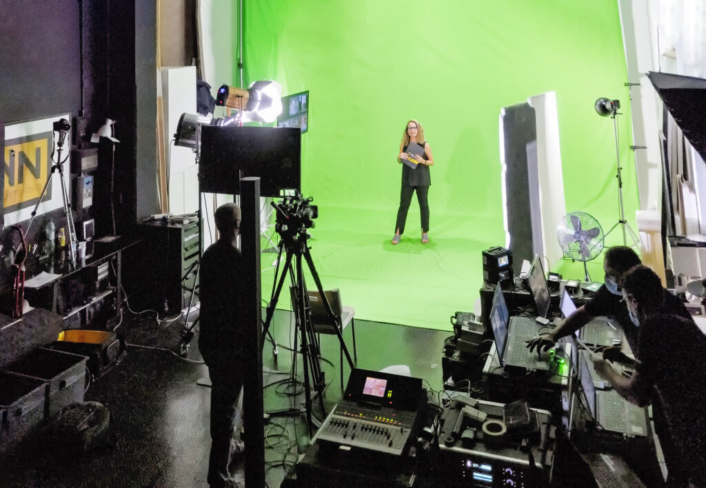 The excitement is palpable at Studio A, Instudio.org as the team works on a movie scene with green screen technology.