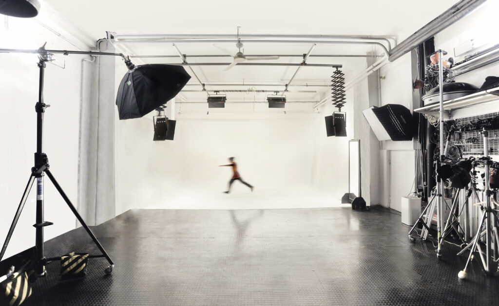 A view of the large white space of Studio A that can be used for a variety of video and photo productions at Instudio.org
